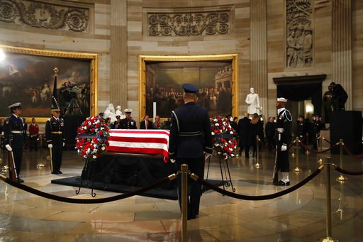 (AP Photo/Jacquelyn Martin). President Donald Trump and first lady Melania Trump leave the Rotunda of the U.S. Capitol after paying their respects to former President George H. W. Bush, Monday, Dec. 3, 2018, in Washington. (AP Photo/Jacquelyn Martin). President Donald Trump and first lady Melania Trump leave the Rotunda of the U.S. Capitol after paying their respects to former President George H. W. Bush, Monday, Dec. 3, 2018, in Washington.