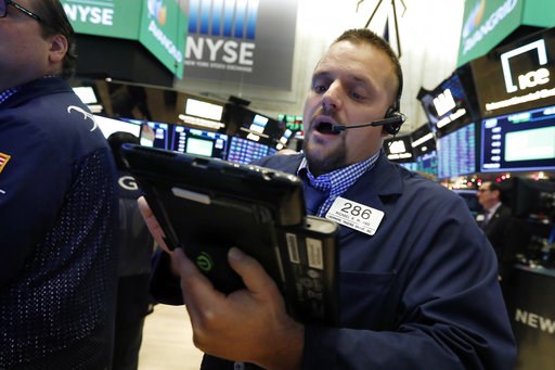 (AP Photo/Richard Drew, File). FILE- In this Nov. 28, 2018, file photo trader Michael Milano works on the floor of the New York Stock Exchange. The U.S. stock market opens at 9:30 a.m. EST on Tuesday, Dec. 4. (AP Photo/Richard Drew, File). FILE- In this Nov. 28, 2018, file photo trader Michael Milano works on the floor of the New York Stock Exchange. The U.S. stock market opens at 9:30 a.m. EST on Tuesday, Dec. 4.