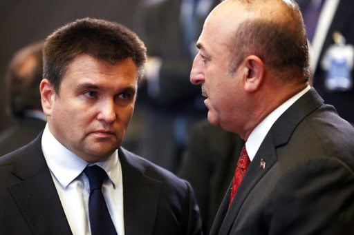 (AP Photo/Francisco Seco). Turkish Foreign Minister Mevlut Cavusoglu, right, speaks with Ukraine's Foreign Minister Pavlo Klimkin during a round table meeting of the North Atlantic Council with Georgia and Ukraine at NATO headquarters in Brussels, Tues... (AP Photo/Francisco Seco). Turkish Foreign Minister Mevlut Cavusoglu, right, speaks with Ukraine's Foreign Minister Pavlo Klimkin during a round table meeting of the North Atlantic Council with Georgia and Ukraine at NATO headquarters in Brussels, Tues...