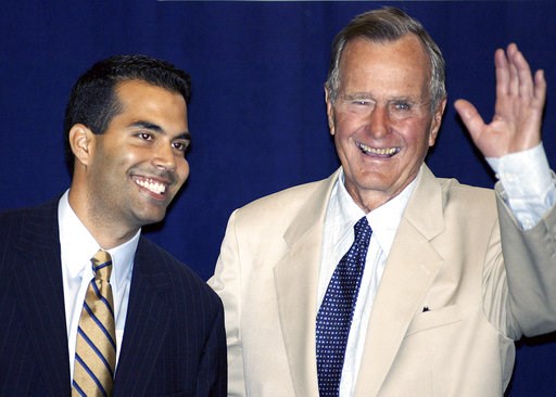 (AP Photo/Ted S. Warren, File). FILE - In this Aug. 31, 2004 file photo. George P. Bush, left, stands hands with his grandfather, former President George H.W. Bush in New York prior to their remarks at a reception hosted by the Hispanic Alliance for Pr... (AP Photo/Ted S. Warren, File). FILE - In this Aug. 31, 2004 file photo. George P. Bush, left, stands hands with his grandfather, former President George H.W. Bush in New York prior to their remarks at a reception hosted by the Hispanic Alliance for Pr...