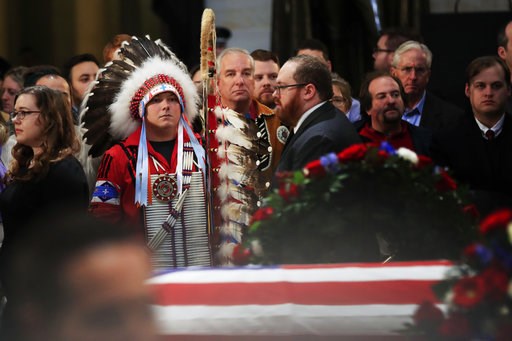 (AP Photo/Manuel Balce Ceneta). Native Americans Donald Woody, left, and Warren Stade of the Shakopee Mdewakanton Sioux Community tribe in Prior Lake, Minn., pay their last respects to former President George H.W. Bush as he lies in state at the U.S. C... (AP Photo/Manuel Balce Ceneta). Native Americans Donald Woody, left, and Warren Stade of the Shakopee Mdewakanton Sioux Community tribe in Prior Lake, Minn., pay their last respects to former President George H.W. Bush as he lies in state at the U.S. C...