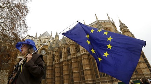 (AP Photo/Kirsty Wigglesworth). An Anti Brexit campaigner waves a European Union flag in Westminster in London, Tuesday, Dec. 4, 2018. Britain's Prime Minister Theresa May is due to address Parliament Tuesday, opening five days of debate before a Dec. ... (AP Photo/Kirsty Wigglesworth). An Anti Brexit campaigner waves a European Union flag in Westminster in London, Tuesday, Dec. 4, 2018. Britain's Prime Minister Theresa May is due to address Parliament Tuesday, opening five days of debate before a Dec. ...
