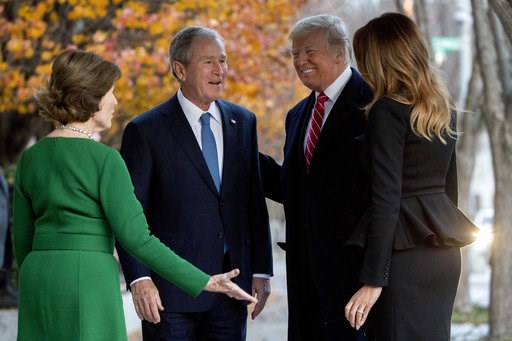 (AP Photo/Andrew Harnik). President Donald Trump and first lady Melania Trump are greeted by former President George Bush and former first lady Laura Bush outside the Blair House across the street from the White House in Washington, Tuesday, Dec. 4, 20... (AP Photo/Andrew Harnik). President Donald Trump and first lady Melania Trump are greeted by former President George Bush and former first lady Laura Bush outside the Blair House across the street from the White House in Washington, Tuesday, Dec. 4, 20...