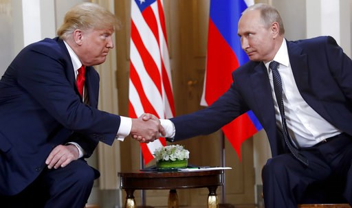 (AP Photo/Pablo Martinez Monsivais). U.S. President Donald Trump, left, and Russian President Vladimir Putin shake hands at the beginning of a meeting at the Presidential Palace in Helsinki, Finland, on July 16, 2018. (AP Photo/Pablo Martinez Monsivais). U.S. President Donald Trump, left, and Russian President Vladimir Putin shake hands at the beginning of a meeting at the Presidential Palace in Helsinki, Finland, on July 16, 2018.