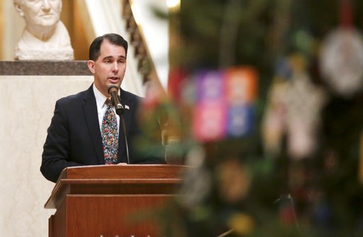 (Steve Apps/Wisconsin State Journal via AP). Wisconsin Gov. Scott Walker speaks during the lighting of the state Christmas Tree in the Capitol Rotunda, Tuesday, Dec. 4, 2018, at the Capitol in Madison, Wis. The Senate and Assembly are set to send dozen... (Steve Apps/Wisconsin State Journal via AP). Wisconsin Gov. Scott Walker speaks during the lighting of the state Christmas Tree in the Capitol Rotunda, Tuesday, Dec. 4, 2018, at the Capitol in Madison, Wis. The Senate and Assembly are set to send dozen...