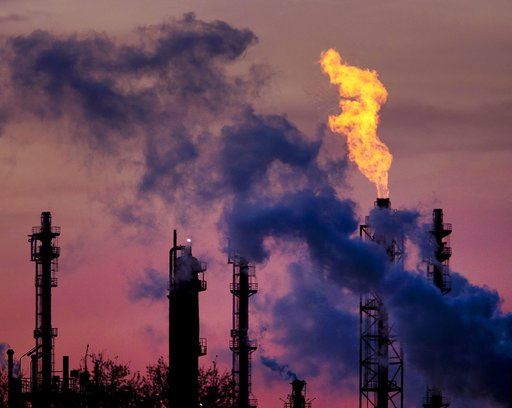 (AP Photo/Michael Probst). A flame emits from a chimney at the BASF chemical company in Ludwigshafen, Germany, Tuesday, Dec. 4, 2018. (AP Photo/Michael Probst). A flame emits from a chimney at the BASF chemical company in Ludwigshafen, Germany, Tuesday, Dec. 4, 2018.