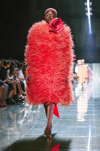 (AP Photo/Kevin Hagen). FILE - This Sept. 12, 2018 file photo shows a model wearing a coral outfit from the Marc Jacobs spring 2019 collection during Fashion Week in New York. Pantone Color Institute has chosen the color Living Coral as its 2019 color ... (AP Photo/Kevin Hagen). FILE - This Sept. 12, 2018 file photo shows a model wearing a coral outfit from the Marc Jacobs spring 2019 collection during Fashion Week in New York. Pantone Color Institute has chosen the color Living Coral as its 2019 color ...