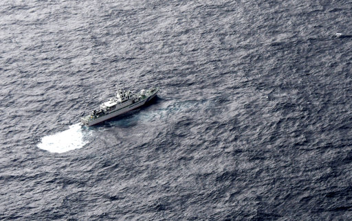 (Kyodo News via AP). In this aerial photo, Japan's Coast Guard ship is seen at sea during a search operation for U.S. Marine refueling plane and fighter jet off Muroto, Kochi prefecture, southwestern Japan, Thursday, Dec. 6, 2018. A Marine refueling pl... (Kyodo News via AP). In this aerial photo, Japan's Coast Guard ship is seen at sea during a search operation for U.S. Marine refueling plane and fighter jet off Muroto, Kochi prefecture, southwestern Japan, Thursday, Dec. 6, 2018. A Marine refueling pl...