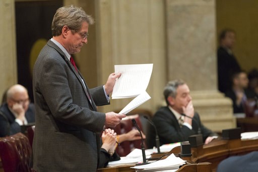 (Mark Hoffman/Milwaukee Journal-Sentinel via AP). State Sen. Tim Carpenter, left, D-Milwaukee, questions a list of about fifty appointment referrals submitted to the State Senate at the Capitol in Madison, Wis., Tuesday, Dec. 4, 2018. Demonstrators boo... (Mark Hoffman/Milwaukee Journal-Sentinel via AP). State Sen. Tim Carpenter, left, D-Milwaukee, questions a list of about fifty appointment referrals submitted to the State Senate at the Capitol in Madison, Wis., Tuesday, Dec. 4, 2018. Demonstrators boo...