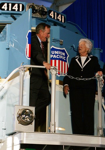 (AP Photo/Pat Sullivan, File). FILE - In this Oct. 18, 2005, file photo, former President George H.W. Bush and his wife, Barbara, tour a new locomotive numbered 4141 in honor of the 41st president at Texas A&M University in College Station, Texas. ... (AP Photo/Pat Sullivan, File). FILE - In this Oct. 18, 2005, file photo, former President George H.W. Bush and his wife, Barbara, tour a new locomotive numbered 4141 in honor of the 41st president at Texas A&M University in College Station, Texas. ...