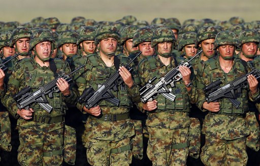 (AP Photo/Darko Vojinovic). In this photo taken on Tuesday, Oct. 17, 2017, Serbian Army soldiers perform during rehearsal exercise in Batajnica, military airport near Belgrade, Serbia. Serbia's prime minister warned on Wednesday, Dec. 5, 2018 that the ... (AP Photo/Darko Vojinovic). In this photo taken on Tuesday, Oct. 17, 2017, Serbian Army soldiers perform during rehearsal exercise in Batajnica, military airport near Belgrade, Serbia. Serbia's prime minister warned on Wednesday, Dec. 5, 2018 that the ...