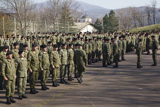 (AP Photo/Visar Kryeziu). In this photo taken March 22, 2018, members of Kosovo Security Force (KSF) line up for the flag raising ceremony inside the barracks in the southern part of the ethnically divided town of Mitrovica, Kosovo. Serbia's prime min... (AP Photo/Visar Kryeziu). In this photo taken March 22, 2018, members of Kosovo Security Force (KSF) line up for the flag raising ceremony inside the barracks in the southern part of the ethnically divided town of Mitrovica, Kosovo. Serbia's prime min...