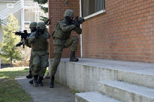 (AP Photo/Visar Kryeziu). In this photo taken March 22, 2018, members of Kosovo Security Force (KSF) train in hostage rescue situation inside the barracks in the southern part of the ethnically divided town of Mitrovica, Kosovo. Serbia's prime minister... (AP Photo/Visar Kryeziu). In this photo taken March 22, 2018, members of Kosovo Security Force (KSF) train in hostage rescue situation inside the barracks in the southern part of the ethnically divided town of Mitrovica, Kosovo. Serbia's prime minister...
