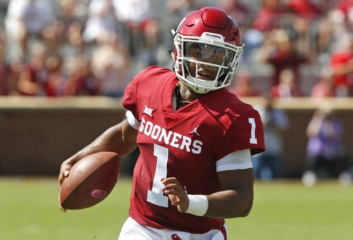 (AP Photo/Sue Ogrocki, File). FILE - In this Sept. 1, 2018, file photo, Oklahoma quarterback Kyler Murray (1) carries the ball in the first half of an NCAA college football game against Florida Atlantic, in Norman, Okla. Murray was named a Heisman Trop... (AP Photo/Sue Ogrocki, File). FILE - In this Sept. 1, 2018, file photo, Oklahoma quarterback Kyler Murray (1) carries the ball in the first half of an NCAA college football game against Florida Atlantic, in Norman, Okla. Murray was named a Heisman Trop...