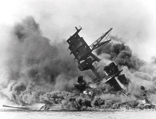 (AP Photo, File). In this Dec. 7, 1941 file photo, smoke rises from the battleship USS Arizona as it sinks during the Japanese attack on Pearl Harbor, Hawaii. About 20 survivors are gathering on Friday, Dec. 7, 2018 at Pearl Harbor to remember thousand... (AP Photo, File). In this Dec. 7, 1941 file photo, smoke rises from the battleship USS Arizona as it sinks during the Japanese attack on Pearl Harbor, Hawaii. About 20 survivors are gathering on Friday, Dec. 7, 2018 at Pearl Harbor to remember thousand...