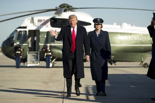 (AP Photo/Andrew Harnik). President Donald Trump walks to board Air Force One at Andrews Air Force Base, Md., Friday, Dec. 7, 2018, to travel to Kansas City, Mo., to speak at the 2018 Project Safe Neighborhoods National Conference. (AP Photo/Andrew Harnik). President Donald Trump walks to board Air Force One at Andrews Air Force Base, Md., Friday, Dec. 7, 2018, to travel to Kansas City, Mo., to speak at the 2018 Project Safe Neighborhoods National Conference.