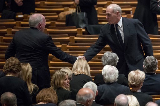 (AP Photo/Andrew Harnik, Pool). Former CIA Director John Brennan, left, shakes hands with President Donald Trump's Chief of Staff John Kelly, right, before a State Funeral for former President George H.W. Bush at the National Cathedral, Wednesday, Dec.... (AP Photo/Andrew Harnik, Pool). Former CIA Director John Brennan, left, shakes hands with President Donald Trump's Chief of Staff John Kelly, right, before a State Funeral for former President George H.W. Bush at the National Cathedral, Wednesday, Dec....