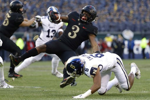 (AP Photo/Matt Slocum). Army's Jordan Asberry, left, is tackled by Navy's Sean Williams during the first half of an NCAA college football game, Saturday, Dec. 8, 2018, in Philadelphia. (AP Photo/Matt Slocum). Army's Jordan Asberry, left, is tackled by Navy's Sean Williams during the first half of an NCAA college football game, Saturday, Dec. 8, 2018, in Philadelphia.