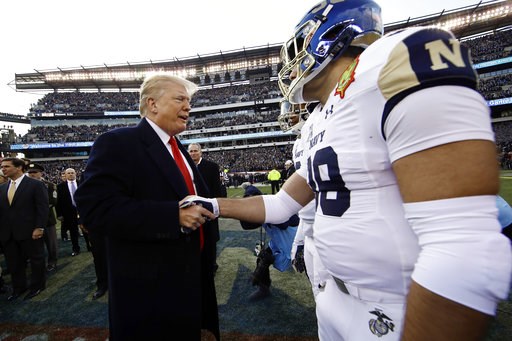 (AP Photo/Matt Rourke). President Donald Trump meets with Navy player Anthony Gargiulo ahead of an NCAA college football game between Army and Navy, Saturday, Dec. 8, 2018, in Philadelphia. (AP Photo/Matt Rourke). President Donald Trump meets with Navy player Anthony Gargiulo ahead of an NCAA college football game between Army and Navy, Saturday, Dec. 8, 2018, in Philadelphia.