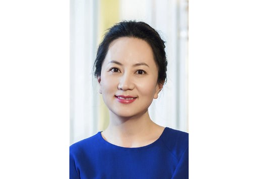 (Huawei via AP). In this undated photo released by Huawei, Huawei's chief financial officer Meng Wanzhou is seen in a portrait photo. China on Thursday, Dec. 6, 2018, demanded Canada release the Huawei Technologies executive who was arrested in a case ... (Huawei via AP). In this undated photo released by Huawei, Huawei's chief financial officer Meng Wanzhou is seen in a portrait photo. China on Thursday, Dec. 6, 2018, demanded Canada release the Huawei Technologies executive who was arrested in a case ...