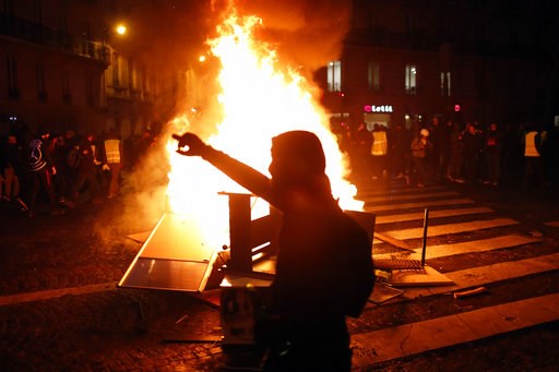 The Latest: French official says Trump should keep quiet