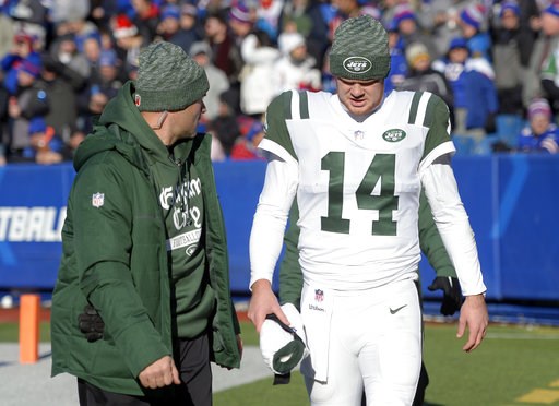 The Latest: Cowboys stretch East lead with OT win vs. Eagles