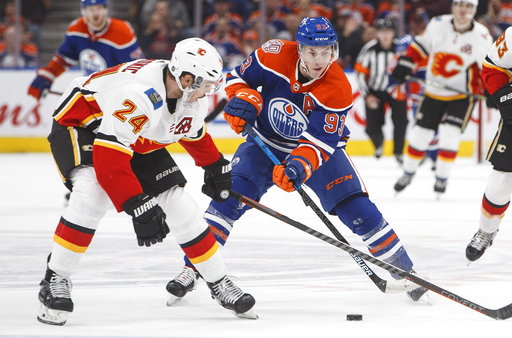 Koskinen, McDavid help Oilers beat Flames 1-0