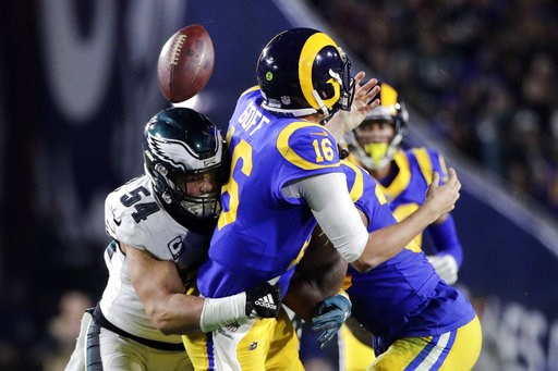 Back in the game: Foles leads Eagles past Rams 30-23