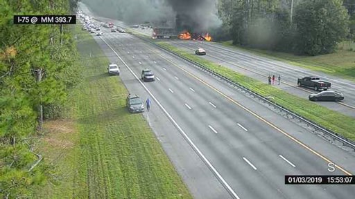 (Alachua County Fire Rescue/Florida 511 via AP). This image taken from a Florida 511 traffic camera and provided by the Alachua County Fire Rescue, shows a fiery crash along Interstate 75, Thursday, Jan. 3, 2019, about a mile south of Alachua, near Gai... (Alachua County Fire Rescue/Florida 511 via AP). This image taken from a Florida 511 traffic camera and provided by the Alachua County Fire Rescue, shows a fiery crash along Interstate 75, Thursday, Jan. 3, 2019, about a mile south of Alachua, near Gai...