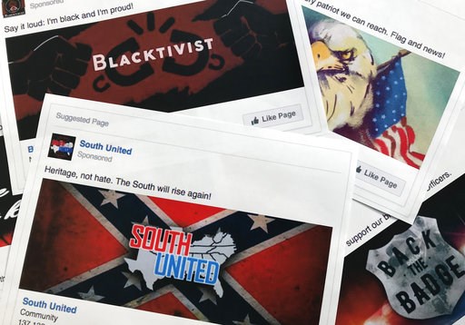 (AP Photo/Jon Elswick, File). FILE - This Nov. 1, 2017 file photo shows prints of some of the Facebook ads linked to a Russian effort to disrupt the American political process and stir up tensions around divisive social issues, released by members of t... (AP Photo/Jon Elswick, File). FILE - This Nov. 1, 2017 file photo shows prints of some of the Facebook ads linked to a Russian effort to disrupt the American political process and stir up tensions around divisive social issues, released by members of t...