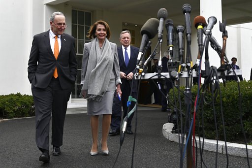 (AP Photo/Susan Walsh). House Speaker Nancy Pelosi of Calif., center, walk with Senate Minority Leader Sen. Chuck Schumer of N.Y., left, and Sen. Dick Durbin, D-Ill., right, to speak with reporters following their meeting with President Donald Trump on... (AP Photo/Susan Walsh). House Speaker Nancy Pelosi of Calif., center, walk with Senate Minority Leader Sen. Chuck Schumer of N.Y., left, and Sen. Dick Durbin, D-Ill., right, to speak with reporters following their meeting with President Donald Trump on...