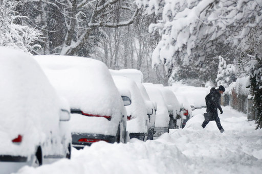 Parts of Austria, southern Germany sink deeper into snow