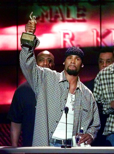 (AP Photo/Mark J. Terrill, File). FILE - In this March 26, 1999 file photo, R. Kelly accepts the Sammy Davis Jr. Award for Male "Entertainer of the Year" at the 13th annual Soul Train Music Awards in Los Angeles. Kelly, one of the top-selling recording... (AP Photo/Mark J. Terrill, File). FILE - In this March 26, 1999 file photo, R. Kelly accepts the Sammy Davis Jr. Award for Male "Entertainer of the Year" at the 13th annual Soul Train Music Awards in Los Angeles. Kelly, one of the top-selling recording...