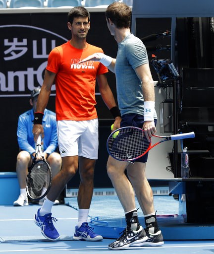 (AP Photo/Mark Baker). Britain's Andy Murray, right, gestures to Serbia's Novak Djokovic during a practice match on Margaret Court Arena ahead of the Australian Open tennis championships IN Melbourne, Australia, Thursday, Jan. 10, 2019. (AP Photo/Mark Baker). Britain's Andy Murray, right, gestures to Serbia's Novak Djokovic during a practice match on Margaret Court Arena ahead of the Australian Open tennis championships IN Melbourne, Australia, Thursday, Jan. 10, 2019.