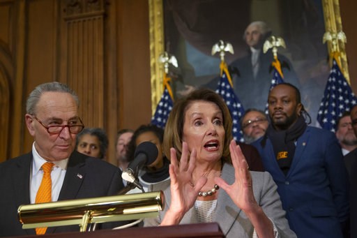 (AP Photo/J. Scott Applewhite). Speaker of the House Nancy Pelosi, D-Calif., and Senate Minority Leader Chuck Schumer, D-N.Y., left, are joined by furloughed federal workers at an event to discuss the impact on families from the partial government shut... (AP Photo/J. Scott Applewhite). Speaker of the House Nancy Pelosi, D-Calif., and Senate Minority Leader Chuck Schumer, D-N.Y., left, are joined by furloughed federal workers at an event to discuss the impact on families from the partial government shut...