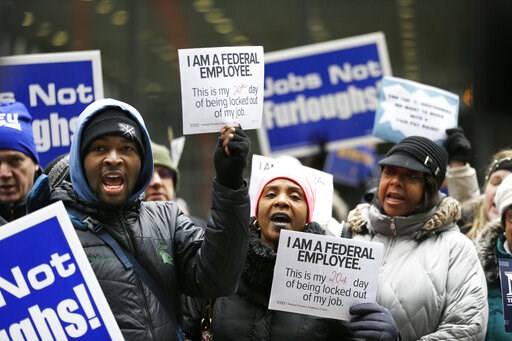(AP Photo/Kiichiro Sato). Government workers rally against the partial government shutdown at Federal Plaza, Thursday, Jan. 10, 2019, in Chicago. The partial government shutdown continues to drag on with hundreds of thousands of federal workers off the... (AP Photo/Kiichiro Sato). Government workers rally against the partial government shutdown at Federal Plaza, Thursday, Jan. 10, 2019, in Chicago. The partial government shutdown continues to drag on with hundreds of thousands of federal workers off the...