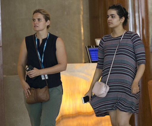 (AP Photo/Sakchai Lalit). Rahaf Mohammed Alqunun, right, walks with an unidentified companion in Bangkok, Thailand, Friday, Jan. 11, 2019. Alqunun, the 18-year old Saudi woman who fled her family to seek asylum, remains in Thailand under the care of th... (AP Photo/Sakchai Lalit). Rahaf Mohammed Alqunun, right, walks with an unidentified companion in Bangkok, Thailand, Friday, Jan. 11, 2019. Alqunun, the 18-year old Saudi woman who fled her family to seek asylum, remains in Thailand under the care of th...