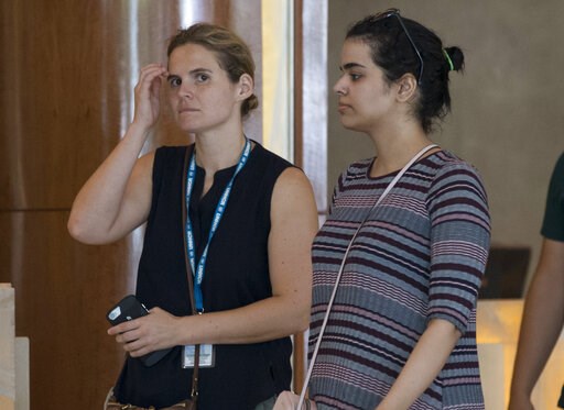 (AP Photo/Sakchai Lalit). Rahaf Mohammed Alqunun, right, walks with an unidentified companion in Bangkok, Thailand, Friday, Jan. 11, 2019. Alqunun, the 18-year old Saudi woman who fled her family to seek asylum, remains in Thailand under the care of th... (AP Photo/Sakchai Lalit). Rahaf Mohammed Alqunun, right, walks with an unidentified companion in Bangkok, Thailand, Friday, Jan. 11, 2019. Alqunun, the 18-year old Saudi woman who fled her family to seek asylum, remains in Thailand under the care of th...