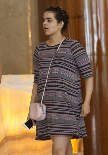 (AP Photo/Sakchai Lalit). Rahaf Mohammed Alqunun holds a mobile phone in Bangkok, Thailand, Friday, Jan. 11, 2019. Alqunun, the 18-year old Saudi woman who fled her family to seek asylum, remains in Thailand under the care of the U.N. refugee agency as... (AP Photo/Sakchai Lalit). Rahaf Mohammed Alqunun holds a mobile phone in Bangkok, Thailand, Friday, Jan. 11, 2019. Alqunun, the 18-year old Saudi woman who fled her family to seek asylum, remains in Thailand under the care of the U.N. refugee agency as...