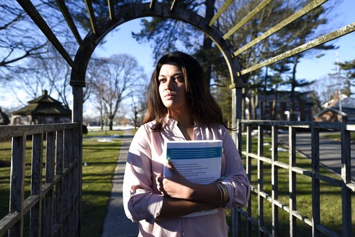 (AP Photo/Kathy Kmonicek). FILE - In this Feb. 2, 2016, file photo, Naila Amin, 26, holds a book from one of the classes she was taking at Nassau Community College in Garden City, N.Y. According to data provided to The Associated Press, the U.S. approv... (AP Photo/Kathy Kmonicek). FILE - In this Feb. 2, 2016, file photo, Naila Amin, 26, holds a book from one of the classes she was taking at Nassau Community College in Garden City, N.Y. According to data provided to The Associated Press, the U.S. approv...