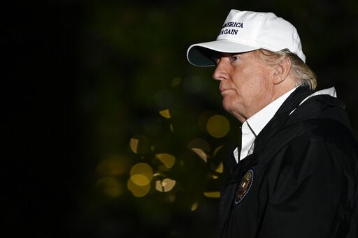 (AP Photo/Susan Walsh). President Donald Trump walks on the South Lawn of the White House in Washington, Thursday, Jan. 10, 2019, after returning from a trip to the southern border. (AP Photo/Susan Walsh). President Donald Trump walks on the South Lawn of the White House in Washington, Thursday, Jan. 10, 2019, after returning from a trip to the southern border.