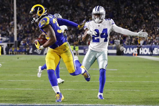 (AP Photo/Marcio Jose Sanchez). Los Angeles Rams running back Todd Gurley scores past Dallas Cowboys cornerback Chidobe Awuzie during the first half in an NFL divisional football playoff game Saturday, Jan. 12, 2019, in Los Angeles. (AP Photo/Marcio Jose Sanchez). Los Angeles Rams running back Todd Gurley scores past Dallas Cowboys cornerback Chidobe Awuzie during the first half in an NFL divisional football playoff game Saturday, Jan. 12, 2019, in Los Angeles.