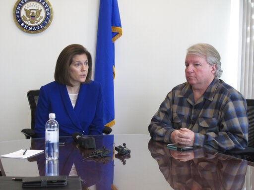 (AP Photo/Scott Sonner). David Pritchett, a furloughed worker for the U.S. Bureau of Land Management, looks on as Sen. Catherine Cortez Masto, D-Nev., talks to reporters Friday, Jan. 11, 2019, in her office in Reno about the impacts of the partial gove... (AP Photo/Scott Sonner). David Pritchett, a furloughed worker for the U.S. Bureau of Land Management, looks on as Sen. Catherine Cortez Masto, D-Nev., talks to reporters Friday, Jan. 11, 2019, in her office in Reno about the impacts of the partial gove...