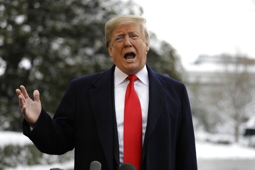 (AP Photo/ Evan Vucci). President Donald Trump talks with reporters on the South Lawn of the White House before departing for the American Farm Bureau Federation's 100th Annual Convention in New Orleans, Monday, Jan. 14, 2019, in Washington. (AP Photo/ Evan Vucci). President Donald Trump talks with reporters on the South Lawn of the White House before departing for the American Farm Bureau Federation's 100th Annual Convention in New Orleans, Monday, Jan. 14, 2019, in Washington.