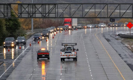 California storms bring mudslide fears, blizzard warning