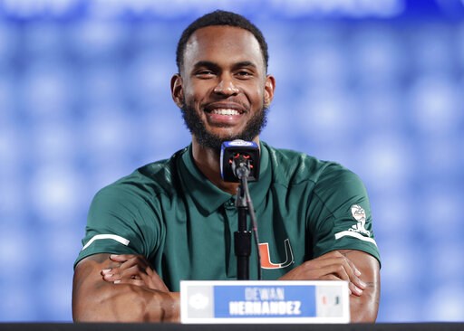 Miami coach says idled Hernandez was 'duped' by AAU coach