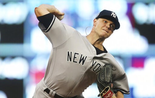 Gray traded from Yanks to Reds after getting new contract
