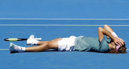 Tsitsipas reaches 1st Slam semi, plugs YouTube; Collins wins