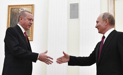 Turkey's president in Moscow for Syria talks with Putin