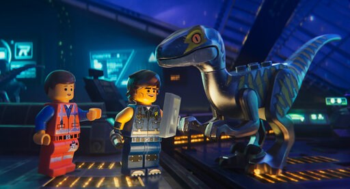 (Warner Bros. Pictures via AP). This image released by Warner Bros. Pictures shows the characters Emmet, left, and Rex Dangervest, center, both voiced by Chris Pratt, in a scene from "The Lego Movie 2: The Second Part." (Warner Bros. Pictures via AP). This image released by Warner Bros. Pictures shows the characters Emmet, left, and Rex Dangervest, center, both voiced by Chris Pratt, in a scene from "The Lego Movie 2: The Second Part."